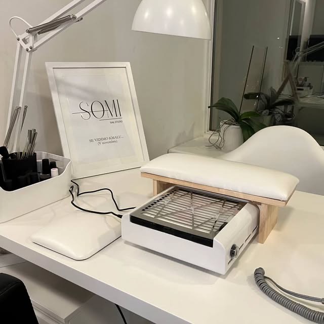 SOMI branded nail studio equipment on a white surface