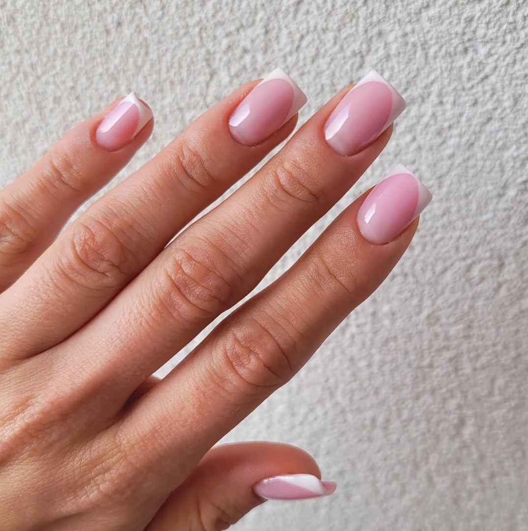 Natural BIAB French manicure, clean close-up
