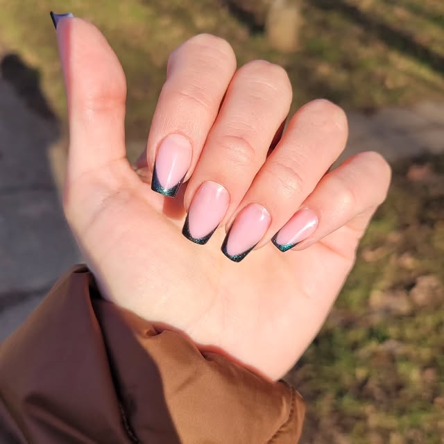 Shimmery glittery nails catching the light