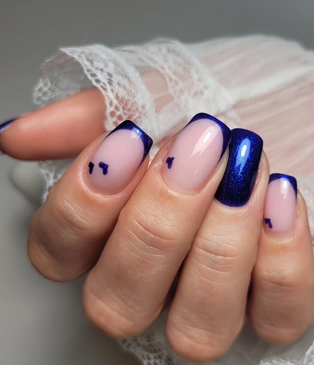 Blue gel polish nail art, close-up